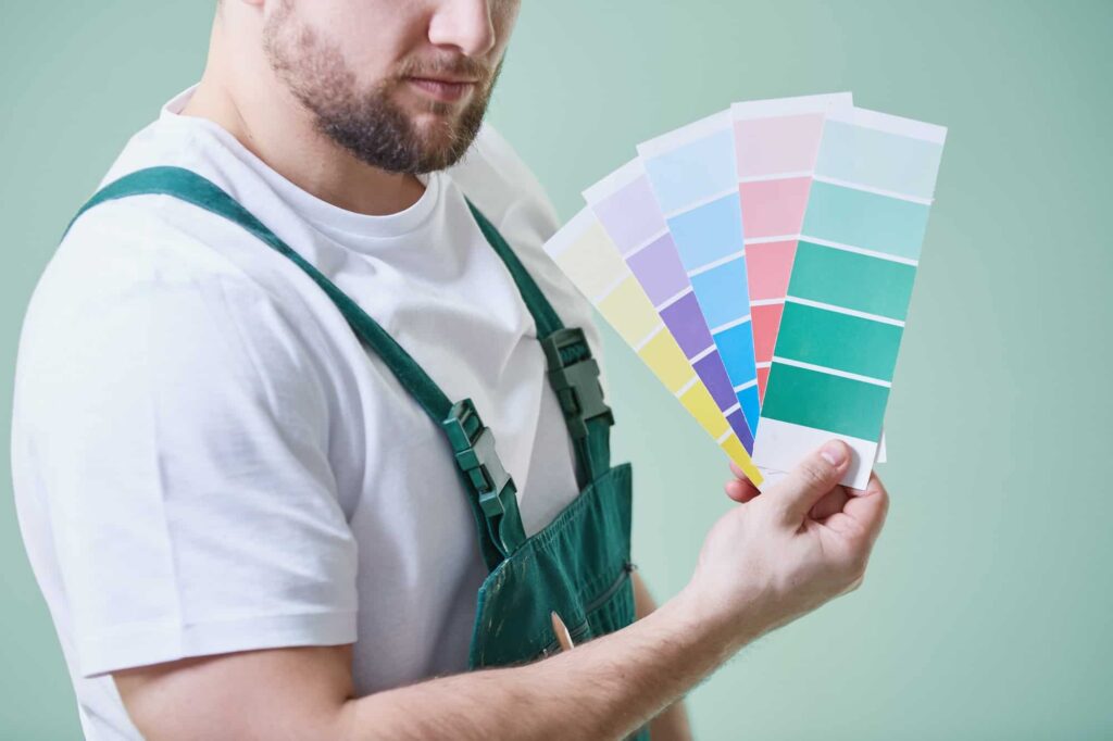 man-holding-color-swatches